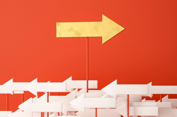 a bright yellow arrow above a sea of white areas pointing the other direction